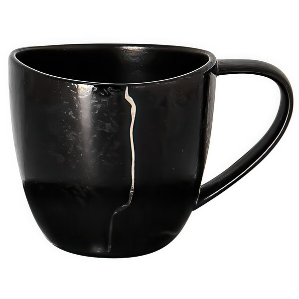 A black espresso cup with silver detail and a white crack.