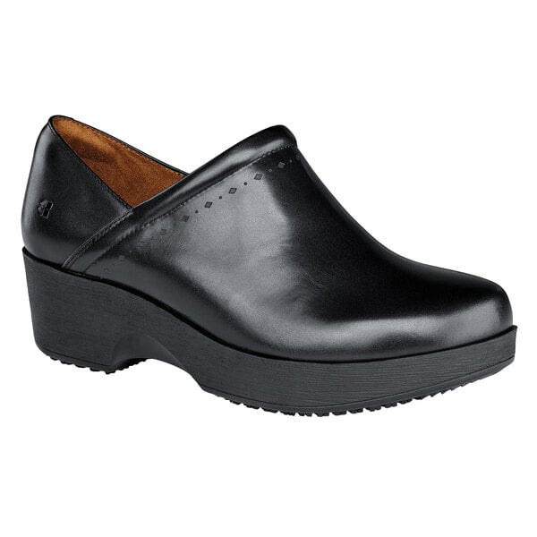 A black leather Women's Juno shoe with a thick rubber sole.