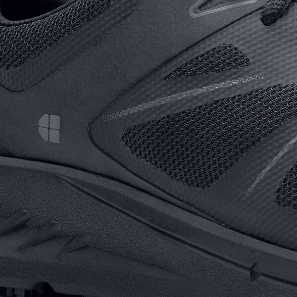 The back of a black Shoes For Crews Vitality II athletic shoe.