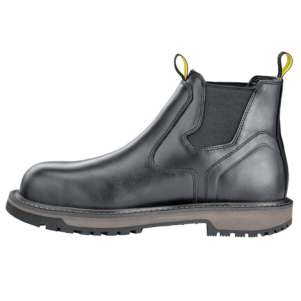 a black boot with a yellow sole