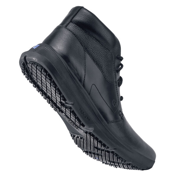 A black Shoes For Crews Holden men's shoe with rubber soles.