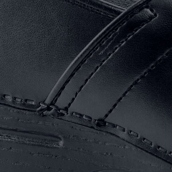 a close up of a black shoe