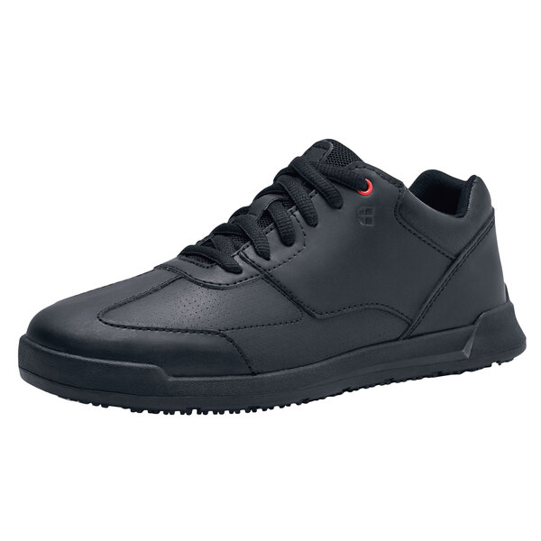 A black water-resistant athletic shoe with a black sole and black laces.