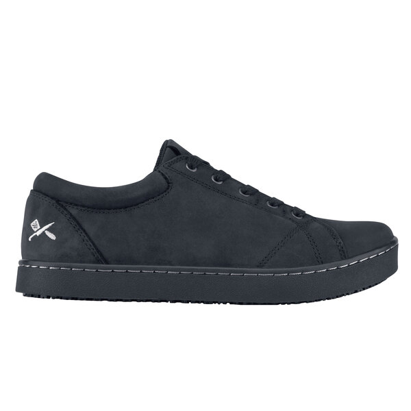 A black MOZO soft toe casual shoe with white stitching.