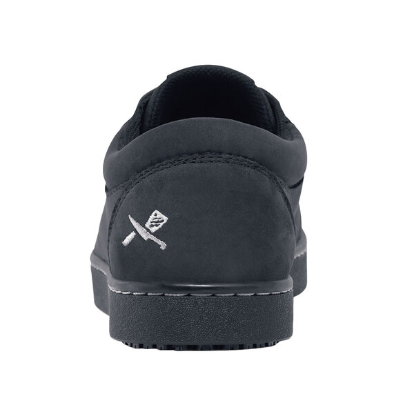 A close-up of a black MOZO casual shoe with a white logo on the side.