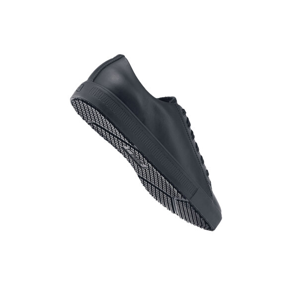 A black Shoes For Crews Old School Low Rider IV men's shoe with a rubber sole.