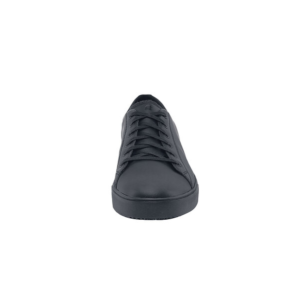A black leather Shoes For Crews Low Rider IV shoe with laces.