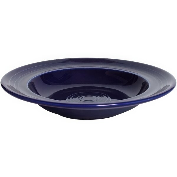 A Tuxton cobalt blue china bowl with a round rim.