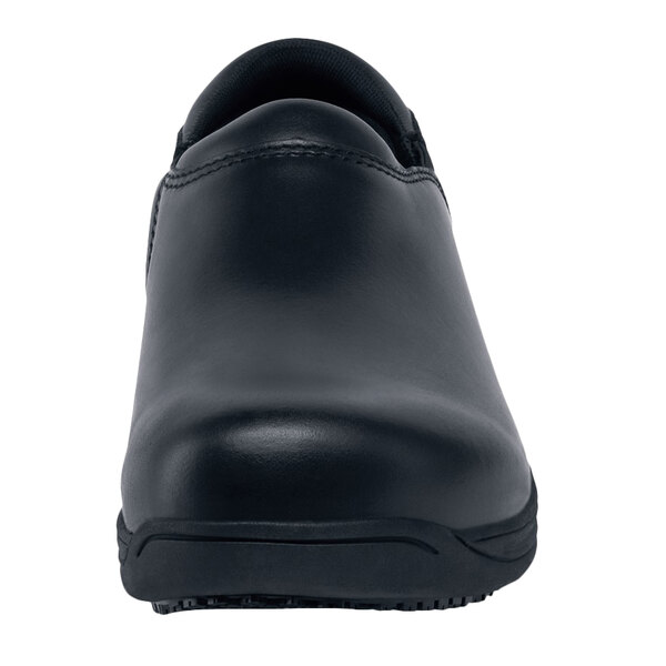 a black shoe with a white background