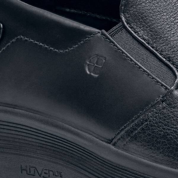 a close up of a black shoe