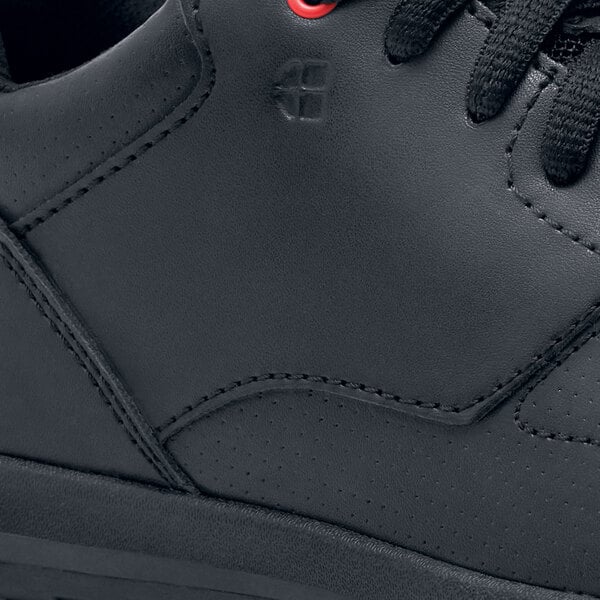 a close up of a black shoe