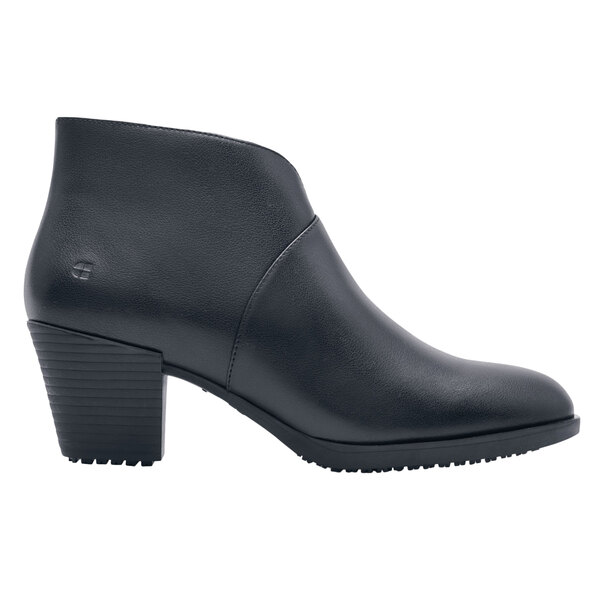 A black Shoes For Crews Delilah women's dress shoe.