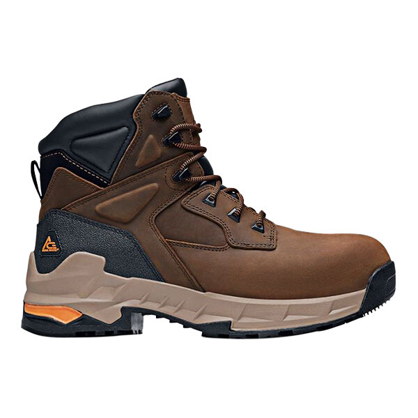 A brown and black leather ACE work boot with orange accents.