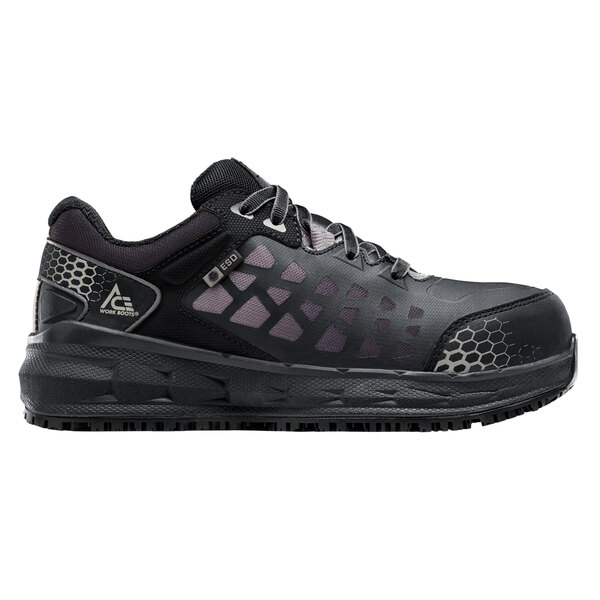 A black and gray Aster women's safety shoe with a pattern on it.