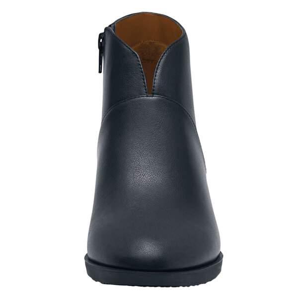 A black leather Shoes For Crews Delilah dress shoe with a zipper.
