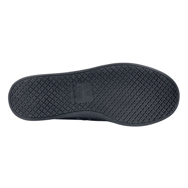 A black MOZO women's casual shoe with a black sole.