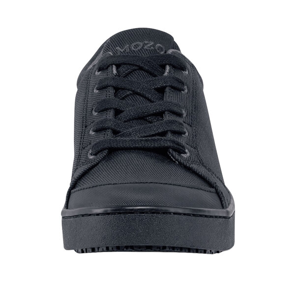 A black MOZO women's casual shoe with laces and a rubber sole.