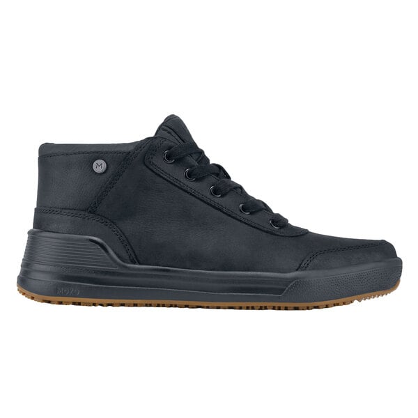 A black MOZO men's shoe with brown rubber soles and laces.