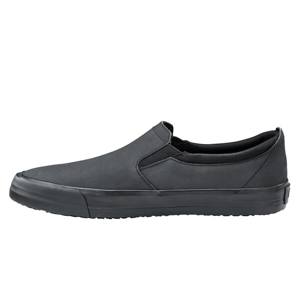 Shoes For Crews unisex black slip-on shoe with a black rubber sole.