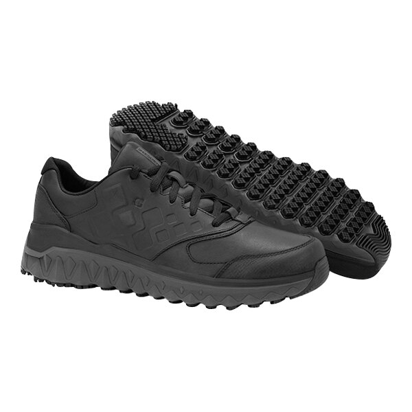 A pair of black Shoes For Crews women's non-slip athletic shoes.