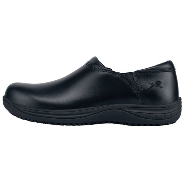 A black leather slip on MOZO casual shoe with a rubber sole.