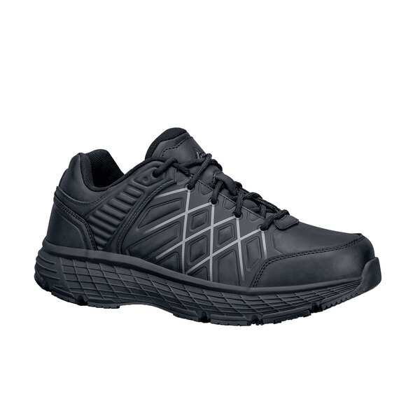 a black shoe with a white background