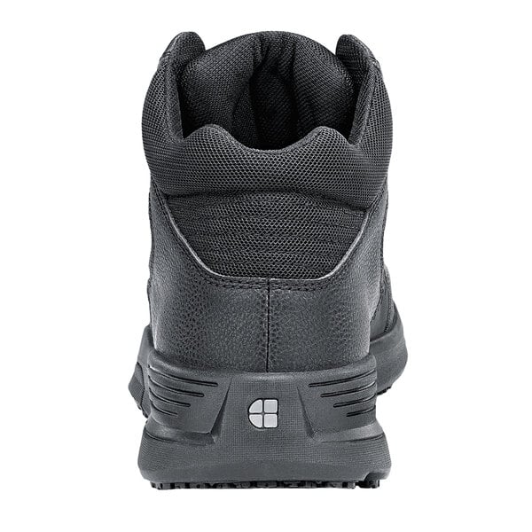 The back of a black Shoes For Crews Hart men's athletic shoe with a white background.