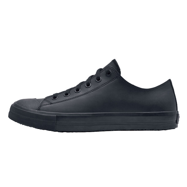 A black leather Shoes For Crews Delray casual shoe with laces and a rubber sole.