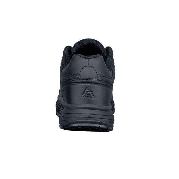 The bottom of a black ACE Trident III men's athletic shoe with a white and black sole.