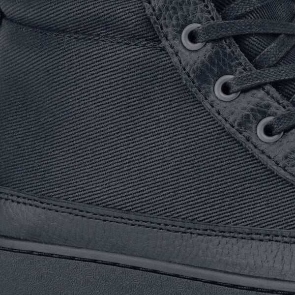 A black Mozo Padma athletic shoe with a side zipper.