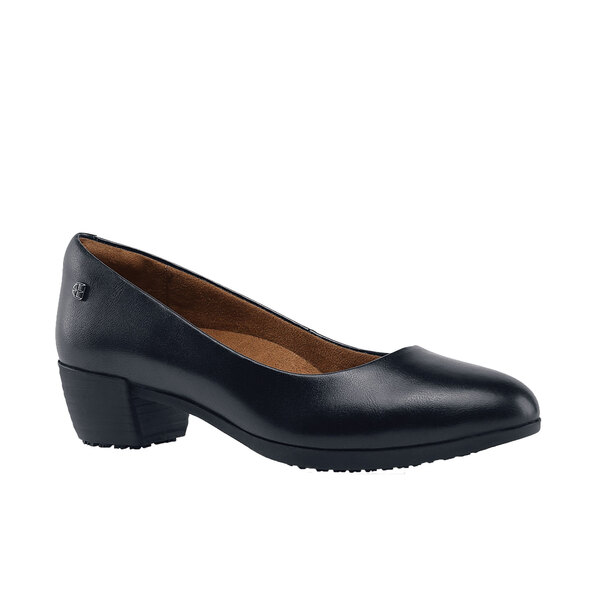 A black leather Women's Shoes For Crews dress shoe with a heel.