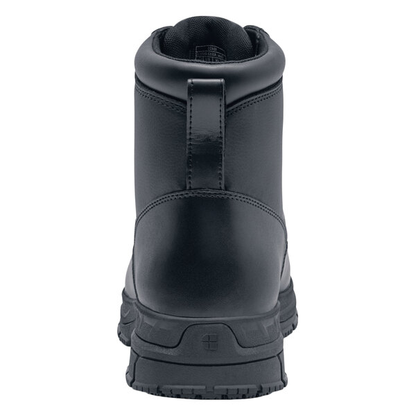 The back of a black Shoes For Crews August work boot with a zipper.