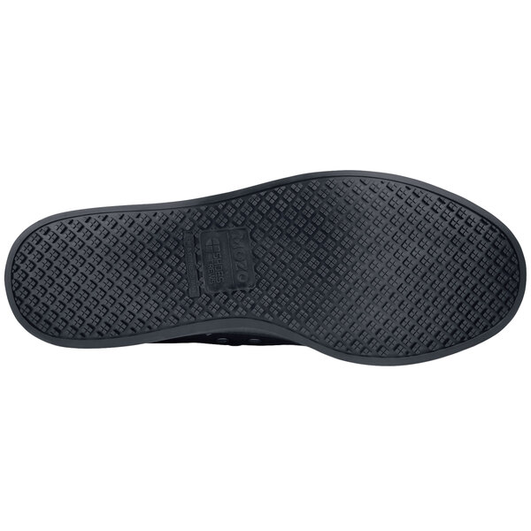 The black sole of a MOZO men's shoe.