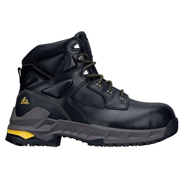 A close-up of a black ACE Burren work boot with yellow accents on the laces.