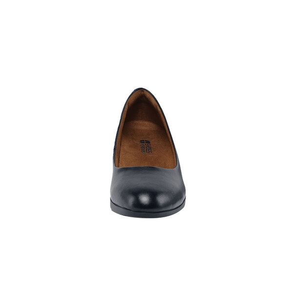 A close up of a black leather Shoes For Crews Willa women's dress shoe with a pointed toe.