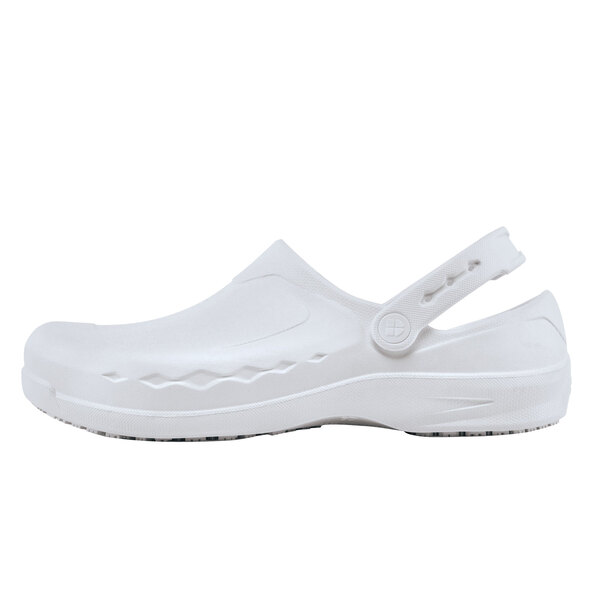 A white Shoes for Crews casual shoe with a logo on the strap.