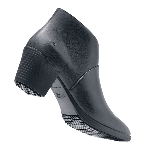 a black boot with a high heel