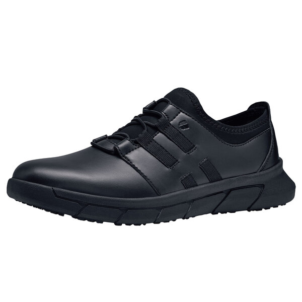 A black water-resistant non-slip athletic shoe for women with laces.