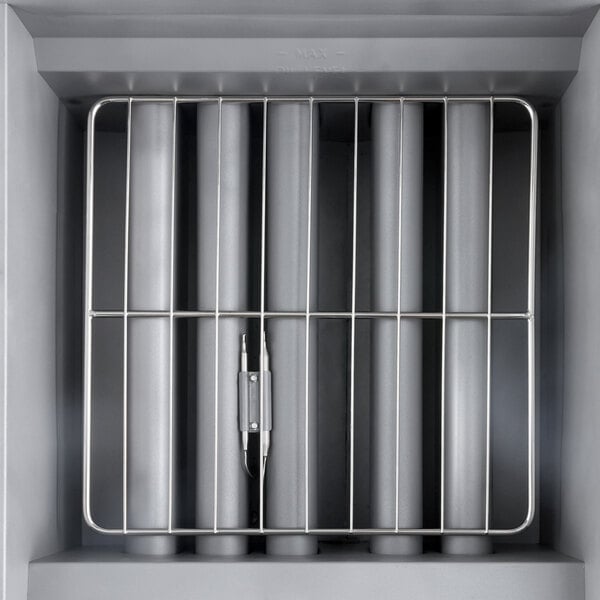 A stainless steel floor fryer with vertical heating tubes and a protective wire guard.