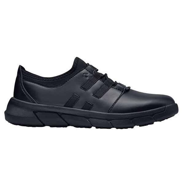 A black women's Water-Resistant athletic shoe with a rubber sole.
