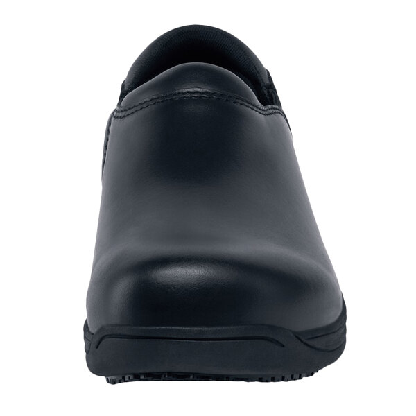 a black shoe with a white background
