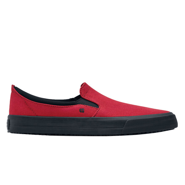 A red and black slip on Shoes For Crews Ollie II shoe with a black sole.