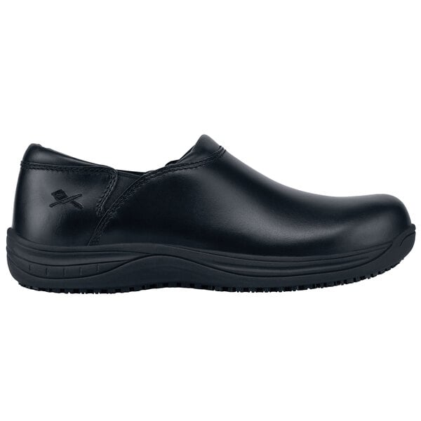 A black MOZO slip on shoe with a black rubber sole.