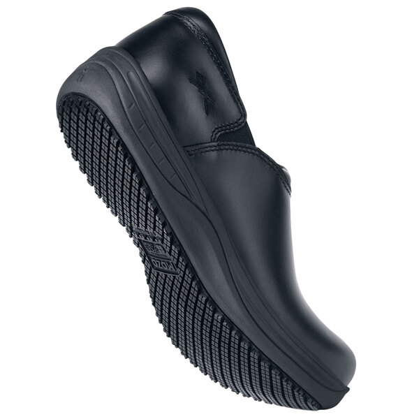 A black MOZO Forza slip-on shoe with a black rubber sole.