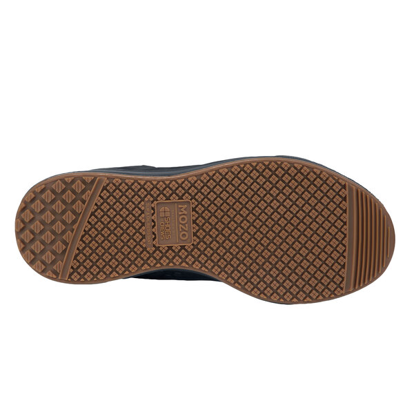 The bottom of a black MOZO men's shoe with a brown sole.