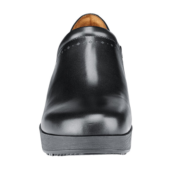 A close-up of a black leather Shoes For Crews Juno women's shoe.