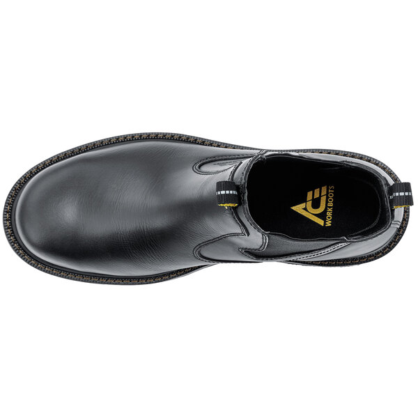 A close-up of a black ACE Firebrand work boot with yellow stitching.
