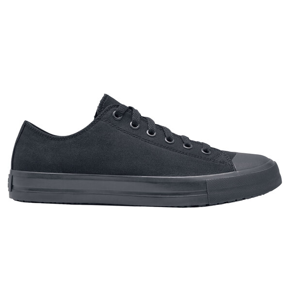 A black Shoes For Crews Delray casual shoe with laces.