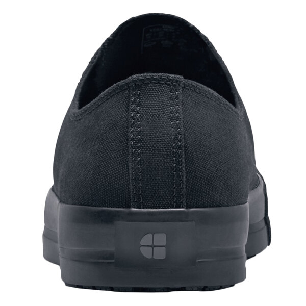 A black canvas Shoes For Crews Delray casual shoe with a rubber sole and toe.