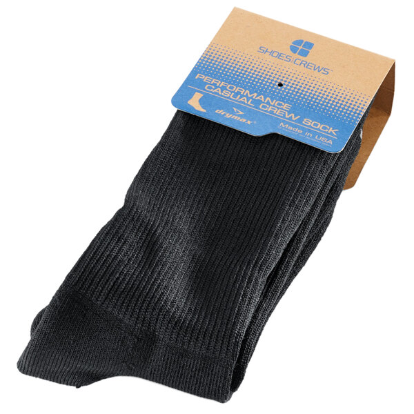 A pair of black Shoes For Crews crew socks with a blue label.